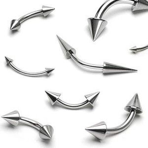 Piercing do obočí z oceli - dva lesklé špičaté hroty - Rozměr: 1, 2 mm x 6 mm x 3x3 mm obraz