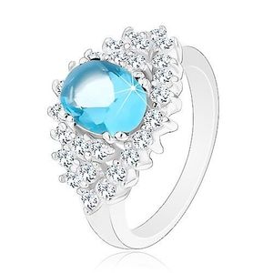 Třpytivý prsten se světle modrým oválným zirkonem, čirá zirkonová obruba - Velikost: 51 obraz
