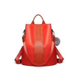 Oranžový batoh s přívěskem Lulu obraz