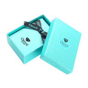 Dárková krabička na diamantové šperky - obdélníková, tyrkysová s logem a černou mašlí obraz