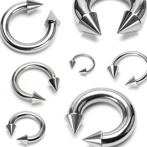 Piercing stříbrné barvy z chirurgické oceli - podkova ukončená hroty - Rozměr: 1.2 mm x 12 mm x 4x4 mm obraz