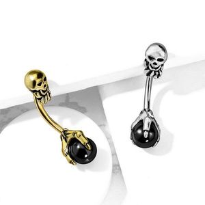 Ocelový piercing do pupíku ve starožitném vzhledu - lebka, černá kulička v drápech - Barva: Zlatá obraz