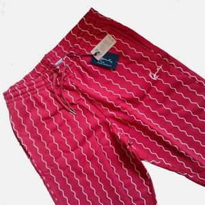 Tepláky Karl Kani Small Signature Ziczac Pinstripe Relaxed Fit Sweatpants dark red/off white obraz