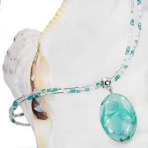 Lampglas Něžný dámský náhrdelník Turquoise Lace s perlou Lampglas s ryzím stříbrem NP5 obraz