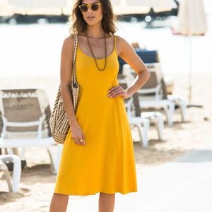 Blancheporte Jednobarevné rozšířené šaty žlutá 56 obraz