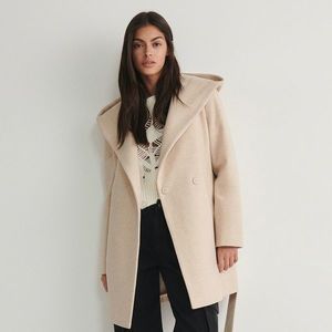 kabát s kapucí obraz