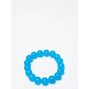 Bracelet of pearls on an azure elastic band obraz