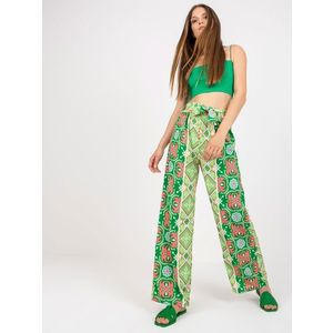 Zelené vzorované látkové kalhoty se širokou nohavicí obraz