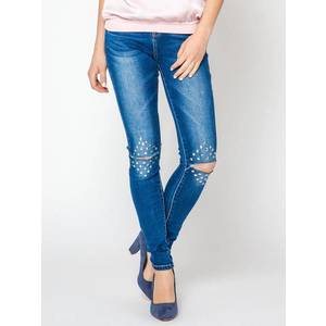 Jeans decorated with cuts and rhinestones on the knees navy blue obraz