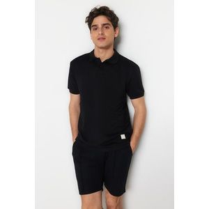 Trendyol Black Regular/Regular Fit Short Sleeve Label Appliqué Polo Neck T-shirt obraz