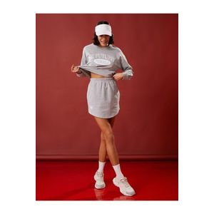 Koton Mini Sportovní Sukně s Elastickým Pasem a Kapsou obraz
