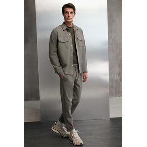 GRIMELANGE Pánské kalhoty Walsh z piké látky se speciální úpravou, flexibilní dvojitou manžetou, elastickým pasem a v khaki barvě. obraz