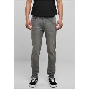 Strečové džínové kalhoty střední šedé barvy obraz