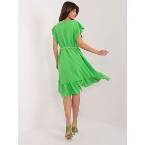 Světle zelené rozevláté šaty s volány obraz