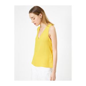 Koton Women's Yellow V-Neck Basic blouse with a loose fit obraz