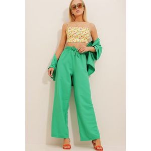 Trend Alaçatı Stili Dámské zelené kalhoty s elastickým pasem, pohodlným střihem, z materiálu aerobin obraz