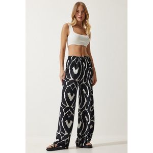 Happiness İstanbul Women's Vivid Black and White Patterned Flowy Viscose Palazzo Trousers obraz