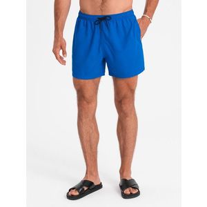 Ombre Neon men's swim shorts with magic print effect - blue obraz